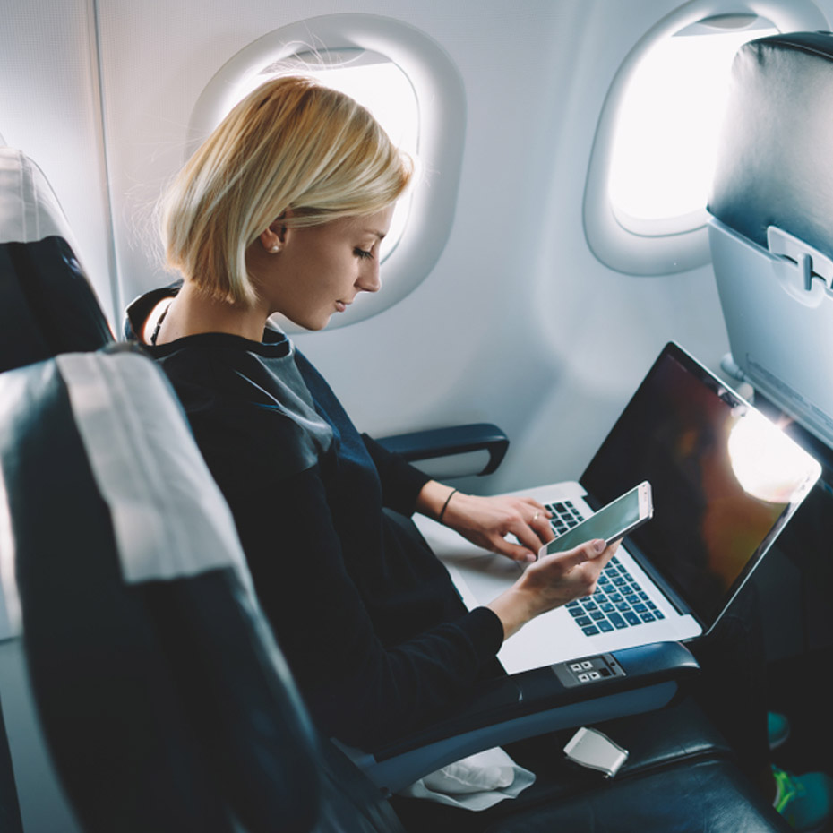 Woman working on airplane