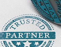 Paper stamped with Trusted Partner